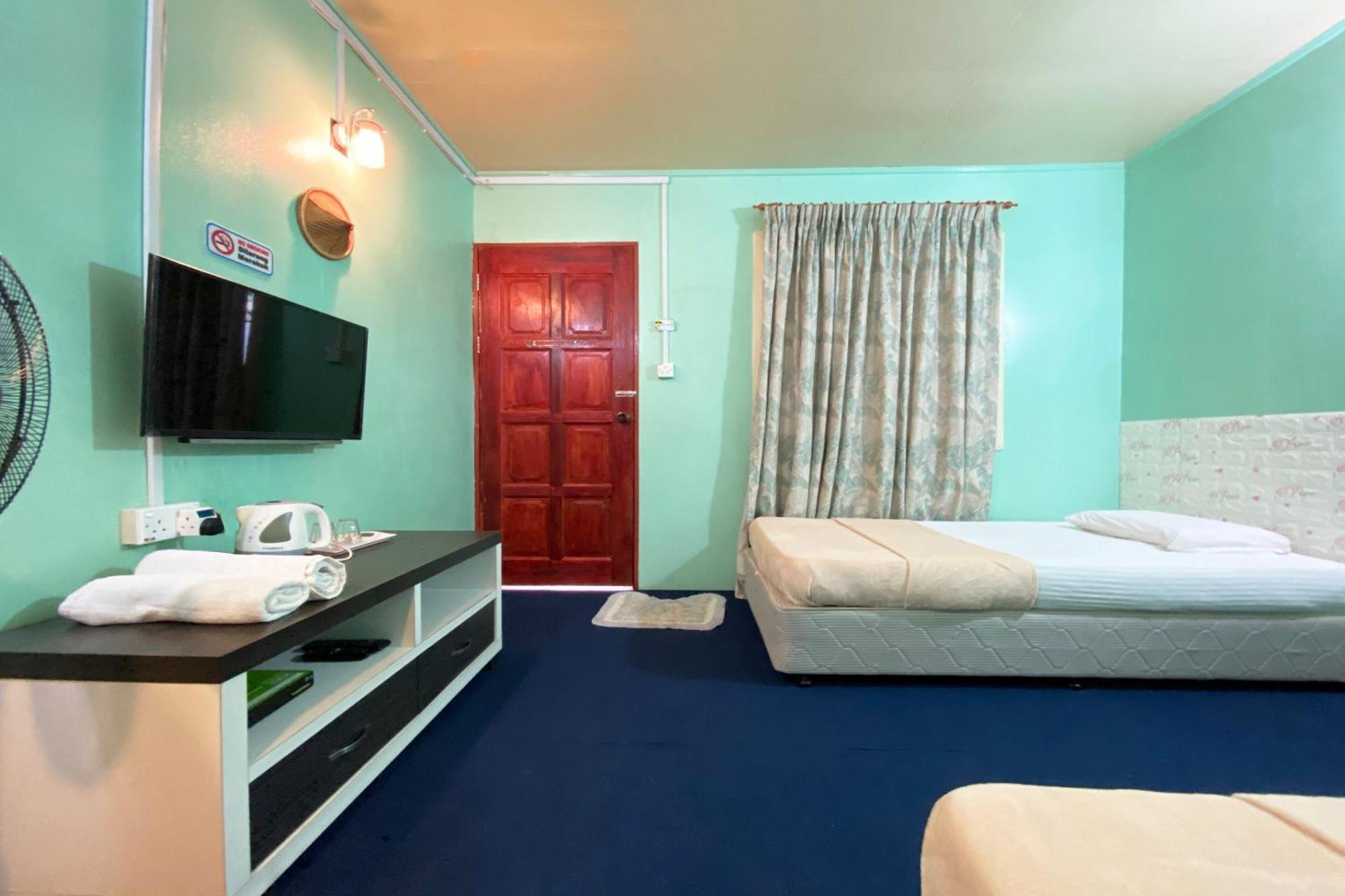 Oyo Home 90285 Pogimpaan Homestay Ранау Экстерьер фото